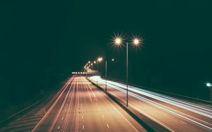 Timelapse photography of highway at night