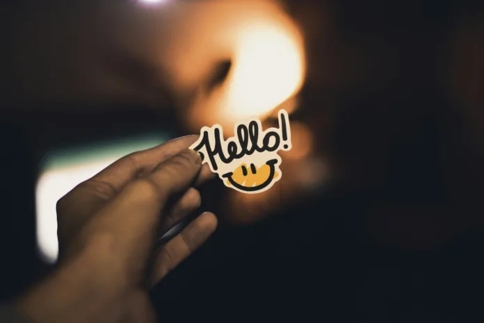 Hello sticker witha. smilie face