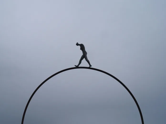 Person walking along the edge of a loop